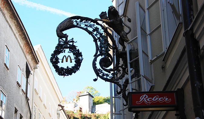 a McDonald's sign in the streets of a tourist area