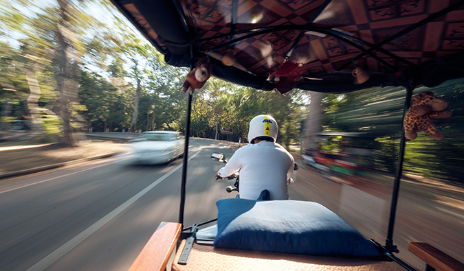 view from the back of a tuk tuk in Southeast Asia