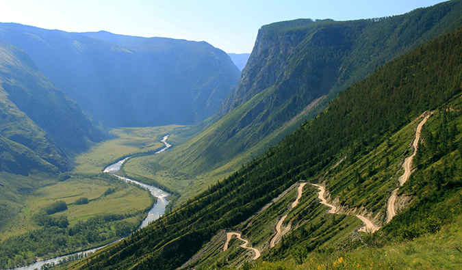 steep hiking trail winding up a mountain