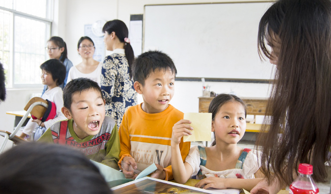 Teaching ESL in a classroom with students in Asia