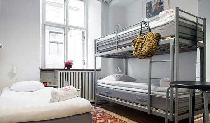 Bunk beds and twin bed in room at Archipelago Old Town, Stockholm