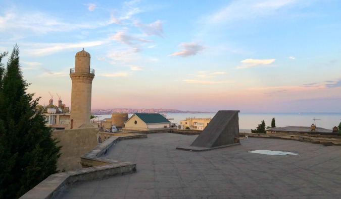 A pastel sunset as seen from an old rooftop in Azerbaijan