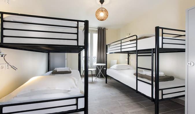 basic 4-bed dorm room at Enjoy Hostel Paris