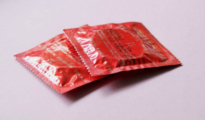 An up-close shot of condoms on a table