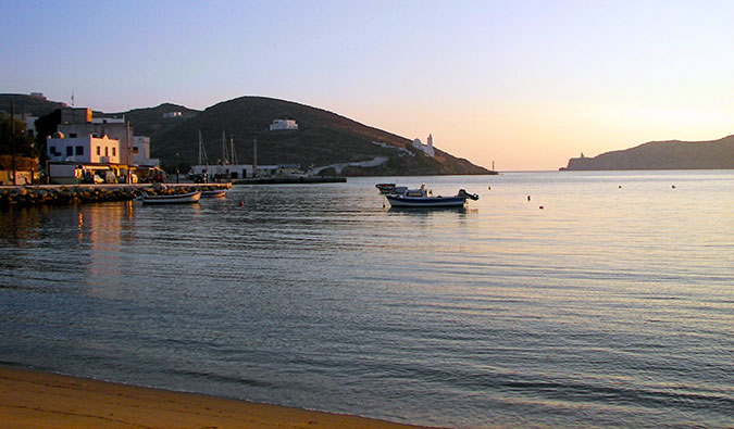 A brilliant sunset over the calm waters on Ios, Greece