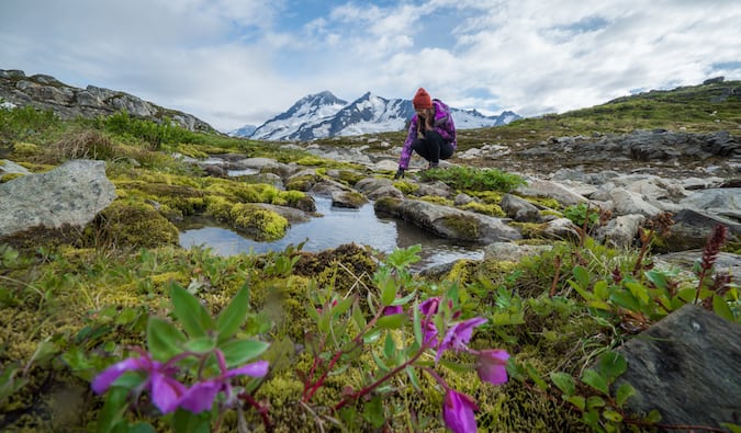 Kristin Addis, a solo female traveler, in the outdoors in Alaska