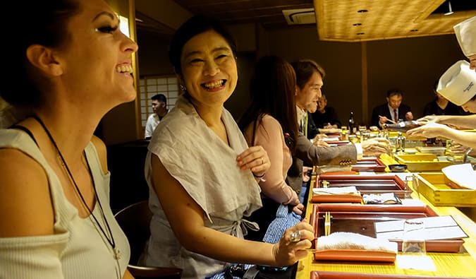 Kristin, a solo female traveler, at a local kaiseki meal in Japan