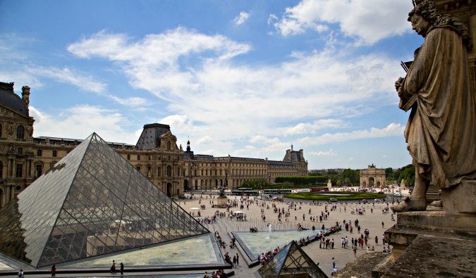 The museum crowds and tourists packed into the Louvre, Paris, France