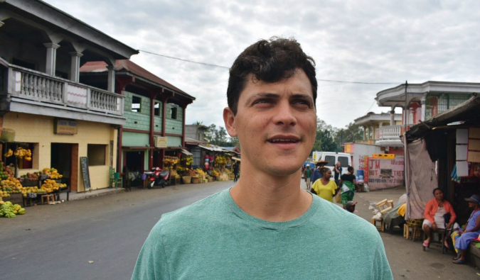 Nomadic Matt exploring the streets of a city in Madagascar