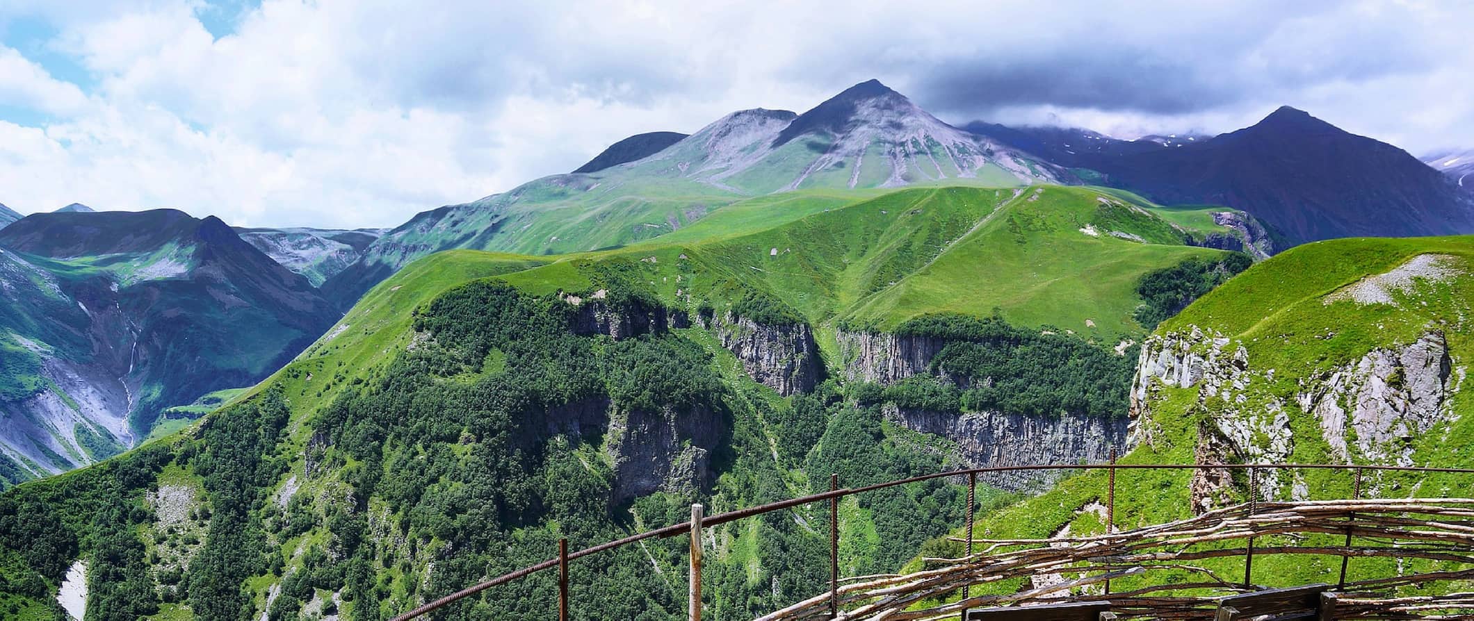 A view of the lush, green mountains in northern Georgia as seen from a scenic viewpoint