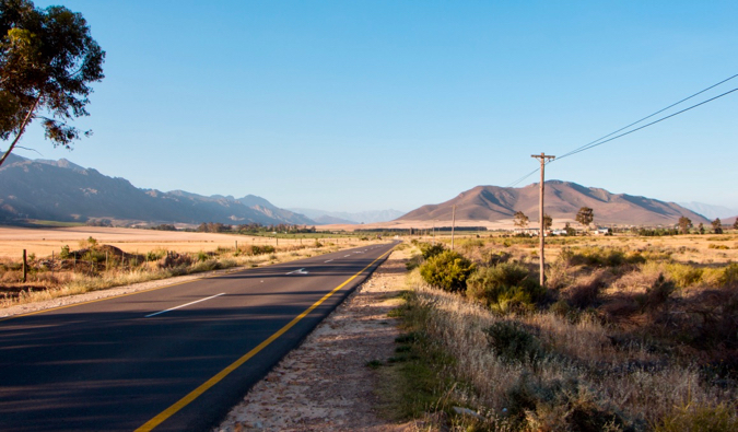 Hitchhiking on an open road in Africa