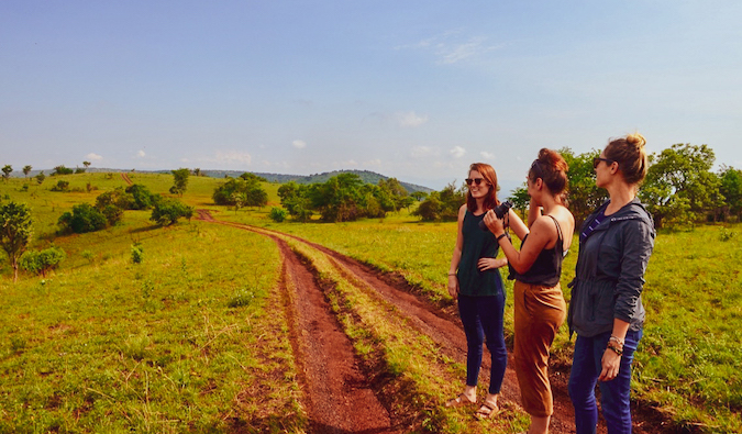 three women on the road in Akagera, Rwanda