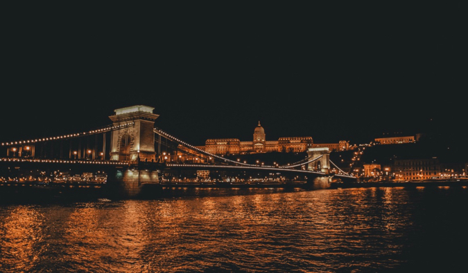 A scenic view overlooking Budapest, Hungary lit up at night