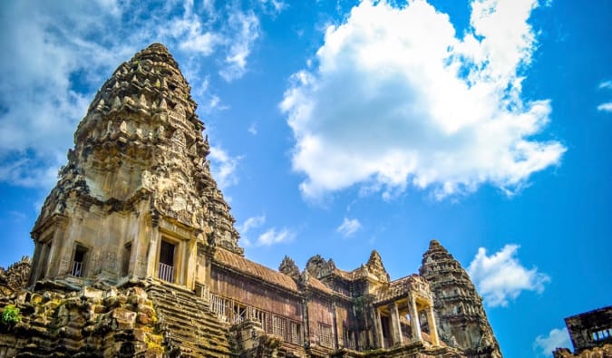 A blue sky over the ancient buildings of Angkor Wat in Cambodia
