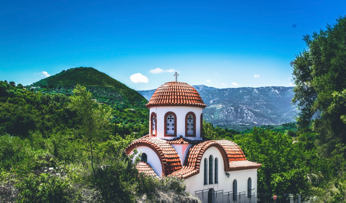 A charming small building surrounded by forests in Greece