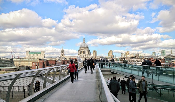 people walking around St. Paul's in London