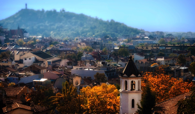 The autumn colours of a small town in Eastern Europe surrounded by trees and nature