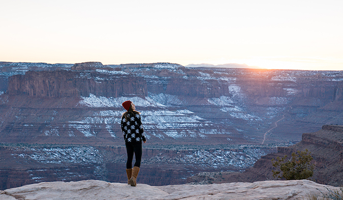 Kristin Addis standing at the edge of the Grand Canyon