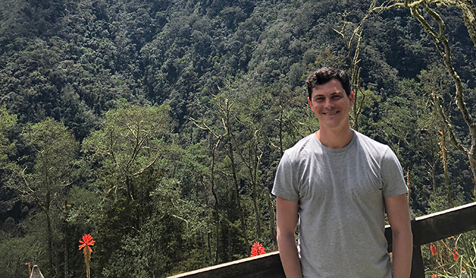 Matt Kepnes posing in front of a mountain in Colombia