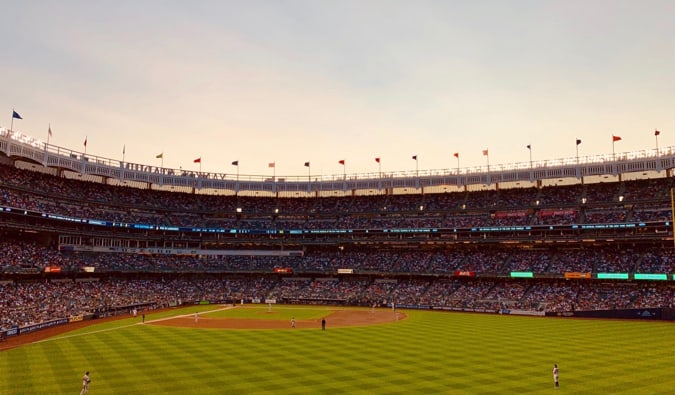 The New York Yankees playing baseball at Yankee Stadium in New York City