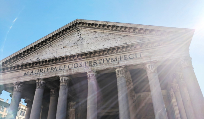 The sun shining over the historic Pantheon in Paris, France