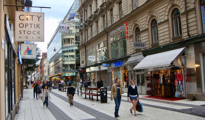 A busy shopping street in the Norrmalm district of Stockholm, Sweden