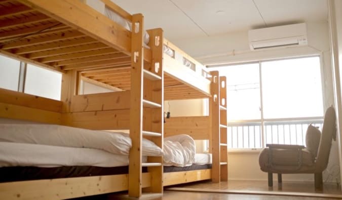 The comfy bunk beds in a dorm room at Hostel Chapter Two in Tokyo, Japan