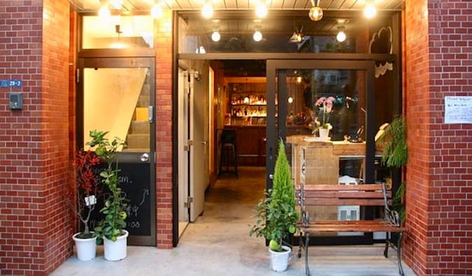 The brick exterior of the Bedgasm hostel in Tokyo, Japan