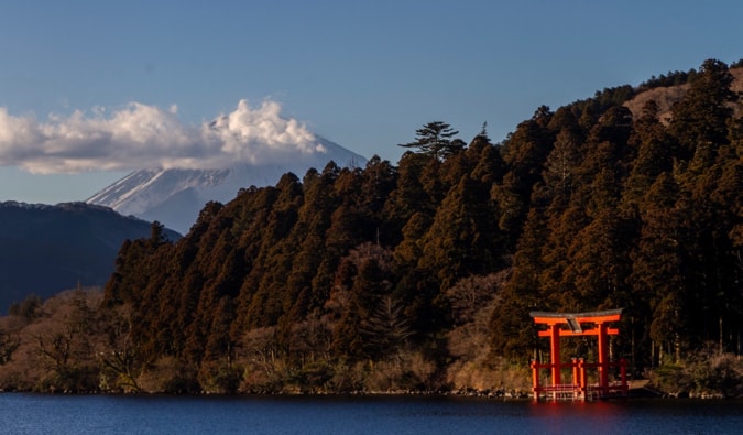 The view of Mount Fuji from Hakone, with a torii gate in the foreground