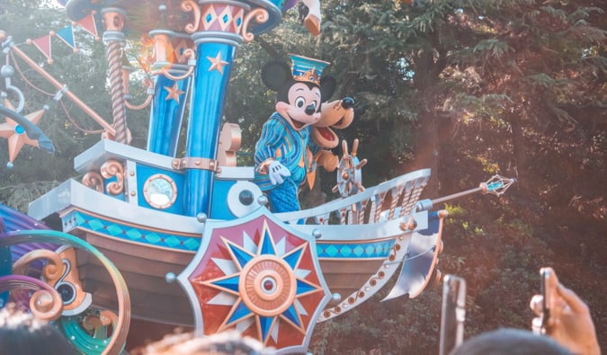 Mickey Mouse on a flat at a parade in Disneyland in Tokyo, Japan