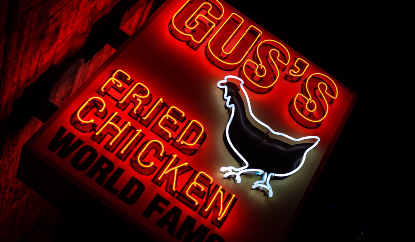 A neon sign for Gus' World Famous Fried Chicken