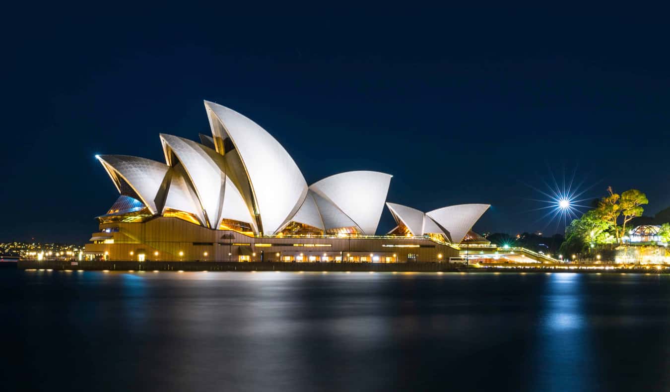 A long-exposure shot of the Sydney Opera House at night