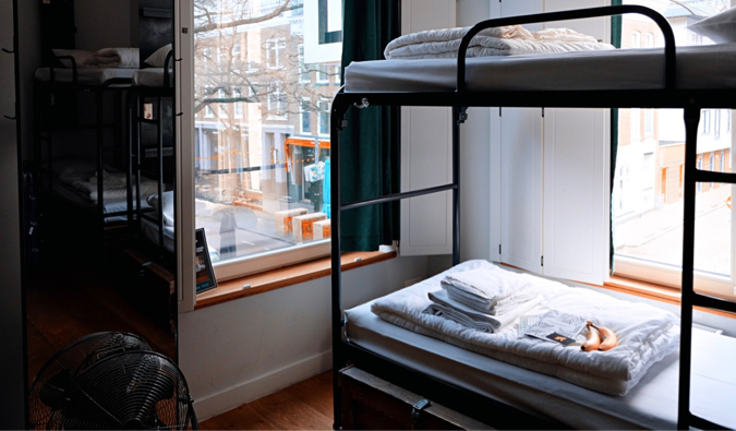 Cozy bunk beds in a hostel dorm room in Europe