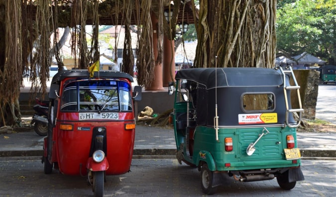 Old tuk-tuks parked together in Sri Lanka