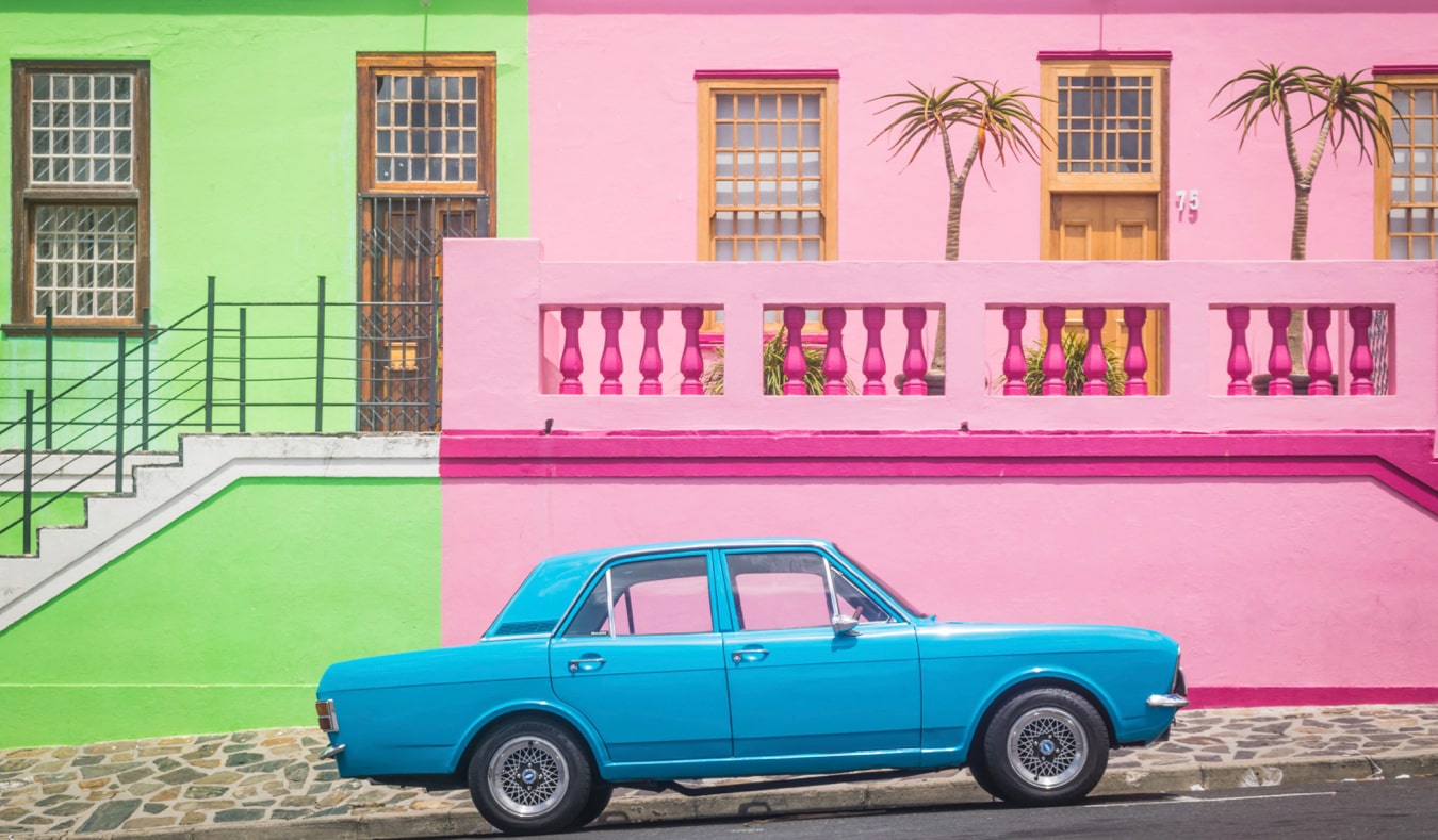 A parked car in the colorful Bo-Kaap neighborhood of Cape Town, South Africa