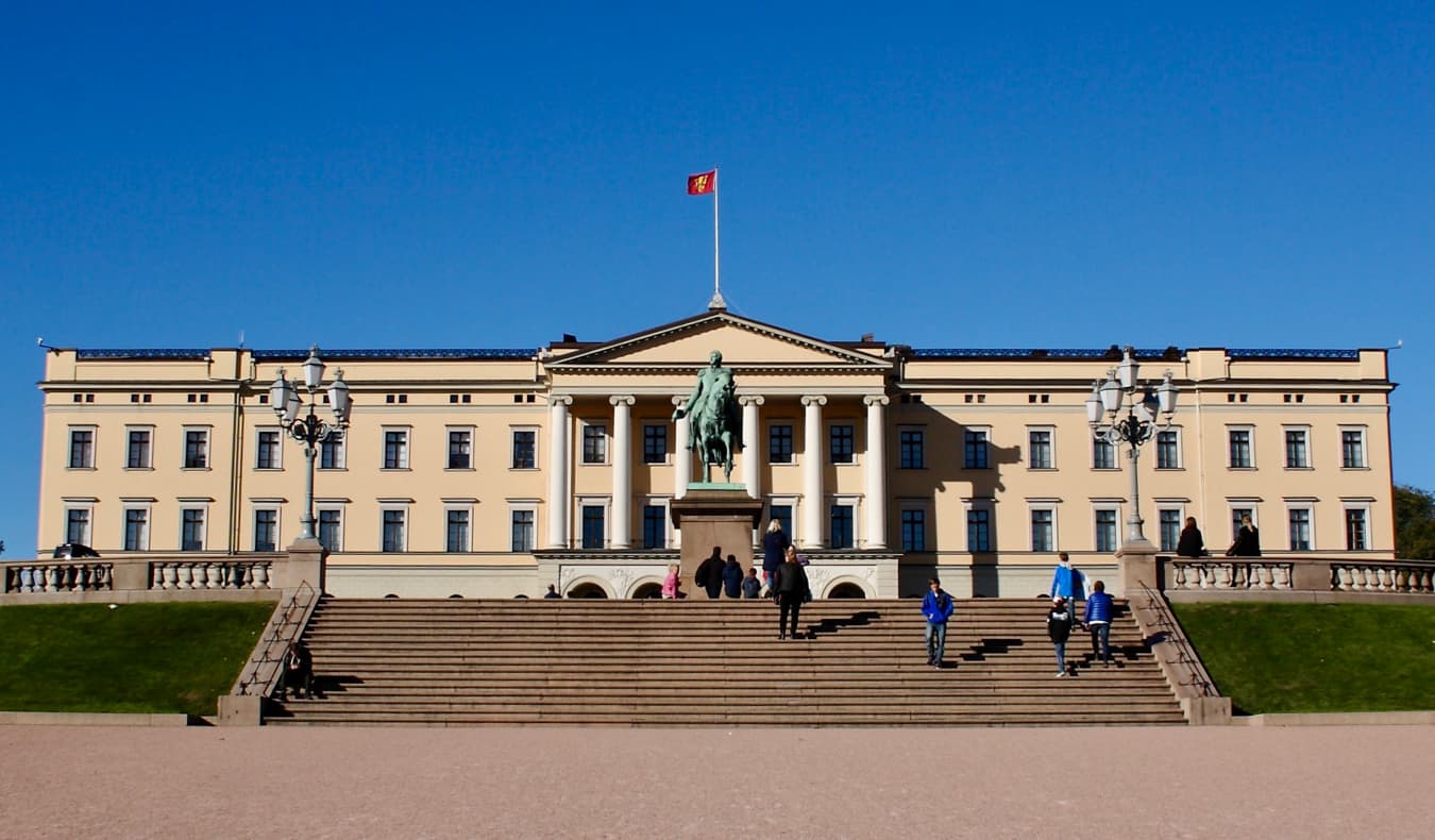 The famous and historic royal palace is Oslo, Norway during the summer