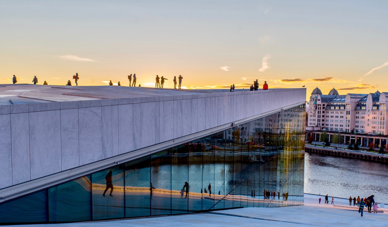 The famous Oslo Opera House in Norway overlooking the city at sunset