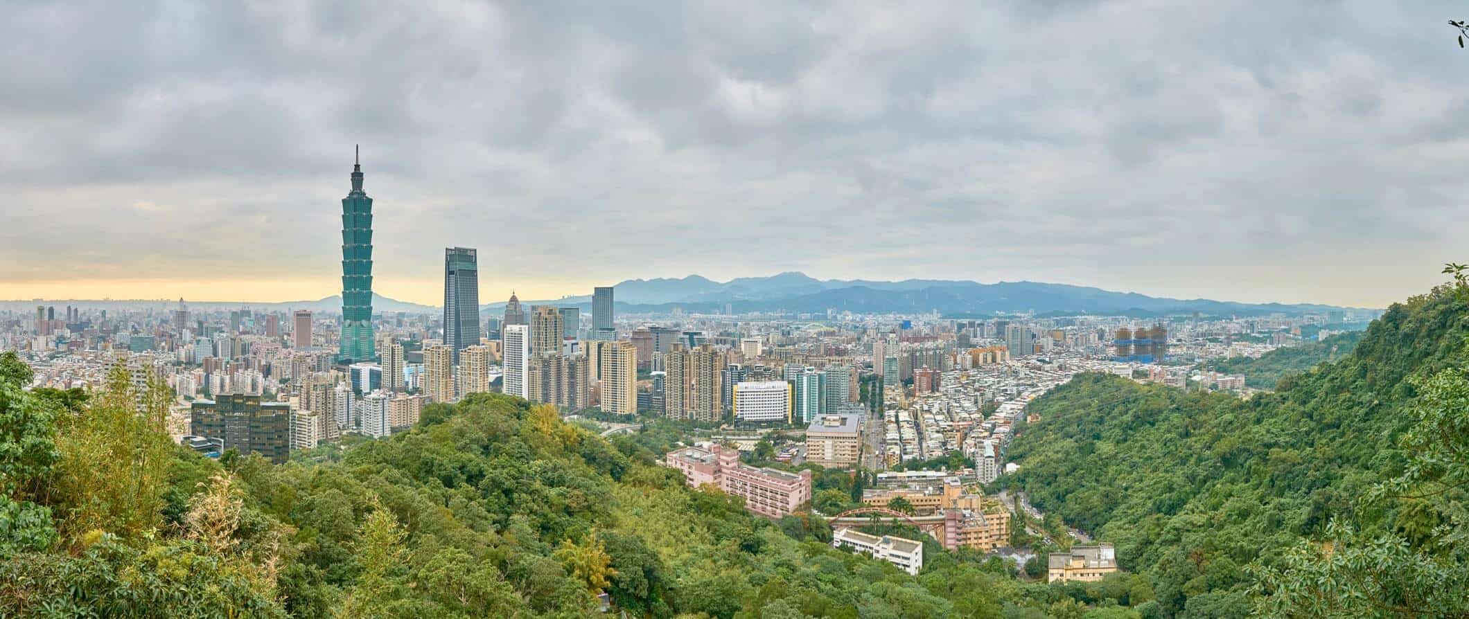 The towering skyline of Taipei, Taiwan featuring Taipei 101