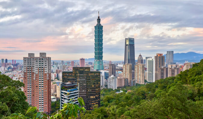 The skyline of Taipei in Taiwan, surrounded by greenery