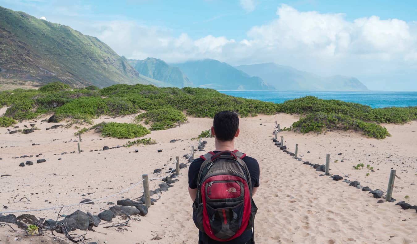 Nomadic Matt posing for a photo in Hawaii while traveling