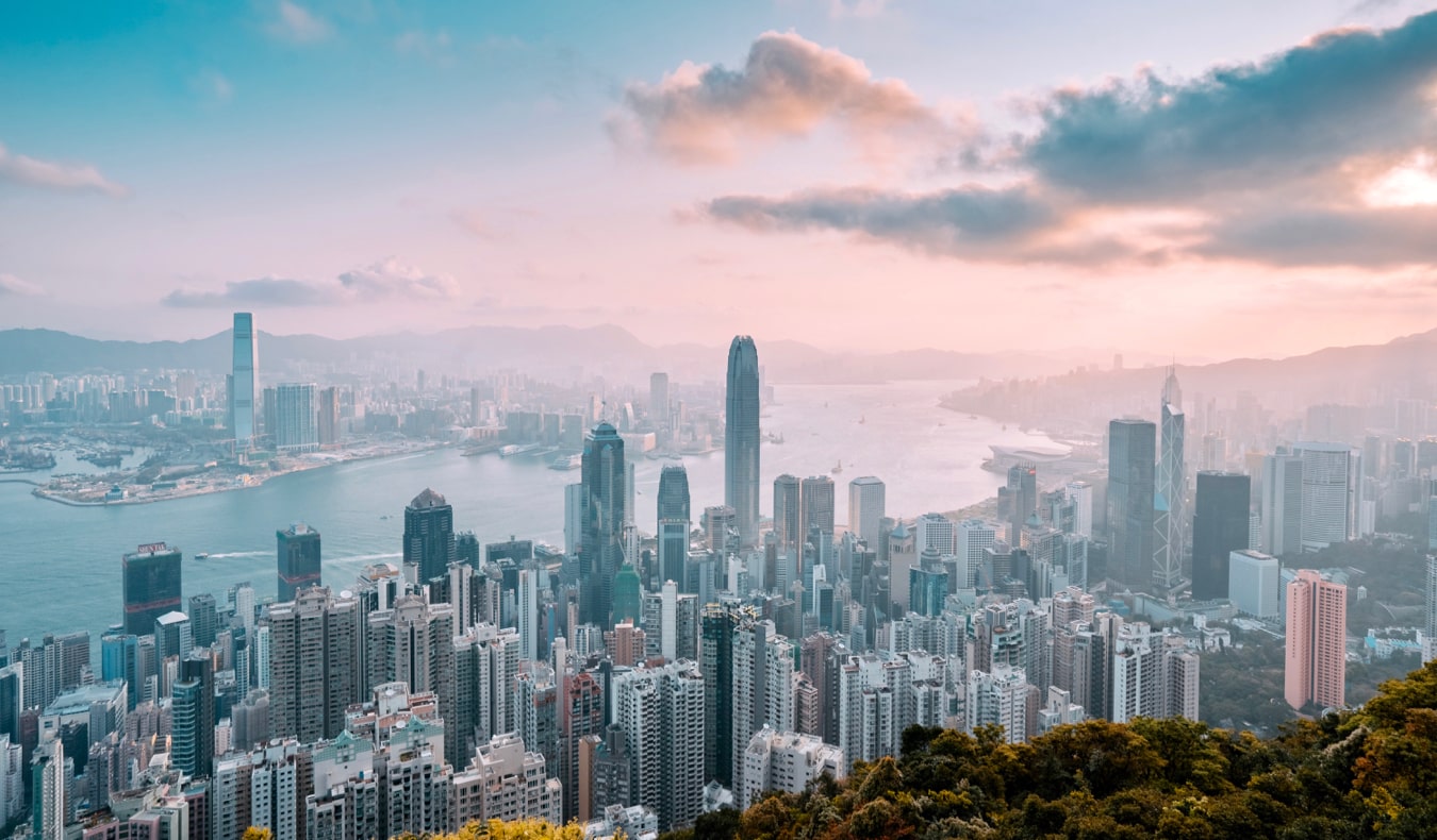 The massive and towering skyline of Hong Kong at sunset