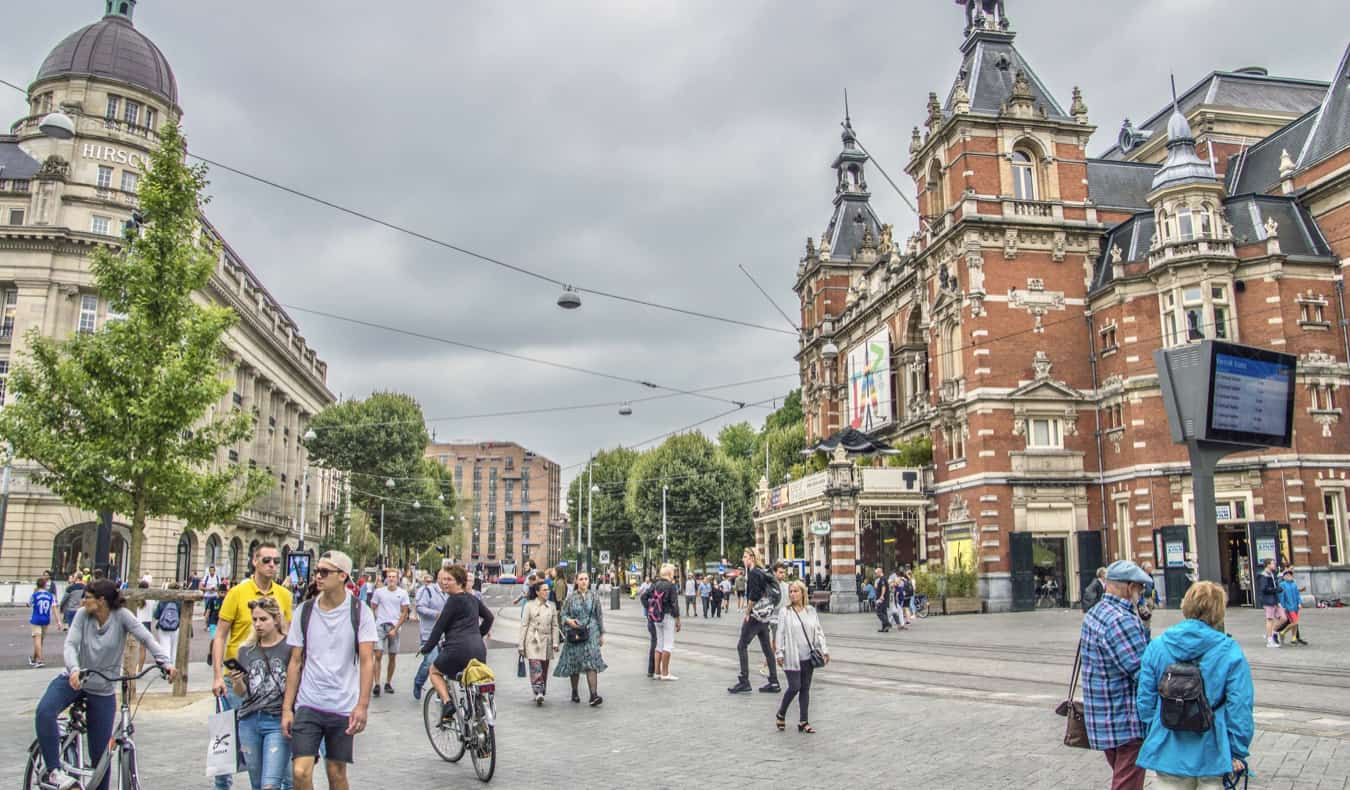 People our and about enjoying the Leidesplein district in Amsterdam, Netherlands