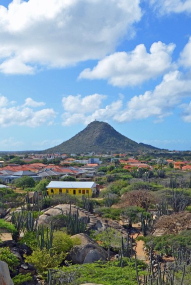 The view overlooking Aruba towards Hooiberg hill in the distance