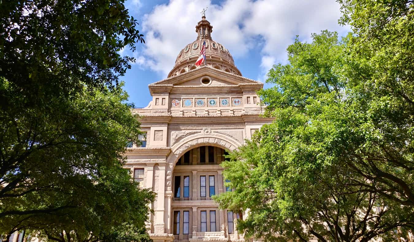 The State Capitol building in Austin, Texas on a bright summer day