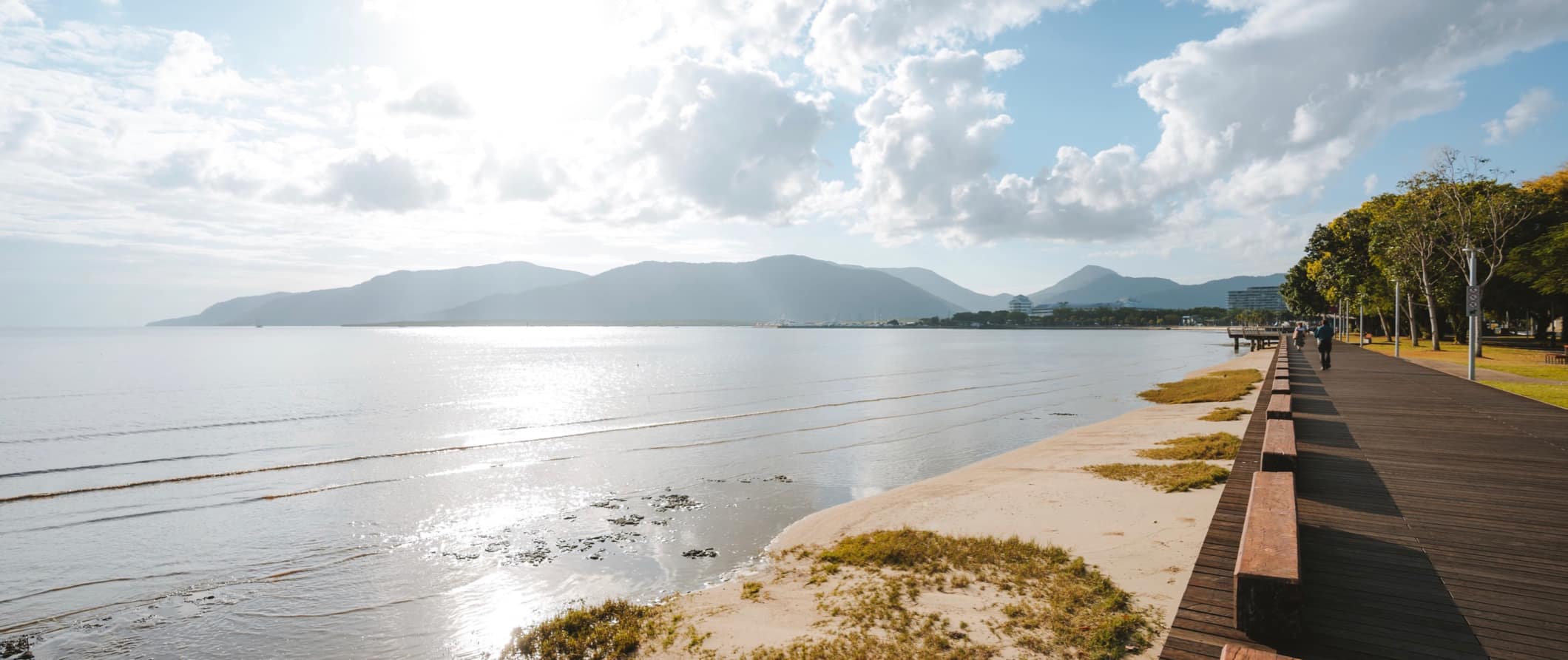 A quiet boardwalk along the ocean in Cairns, Australia