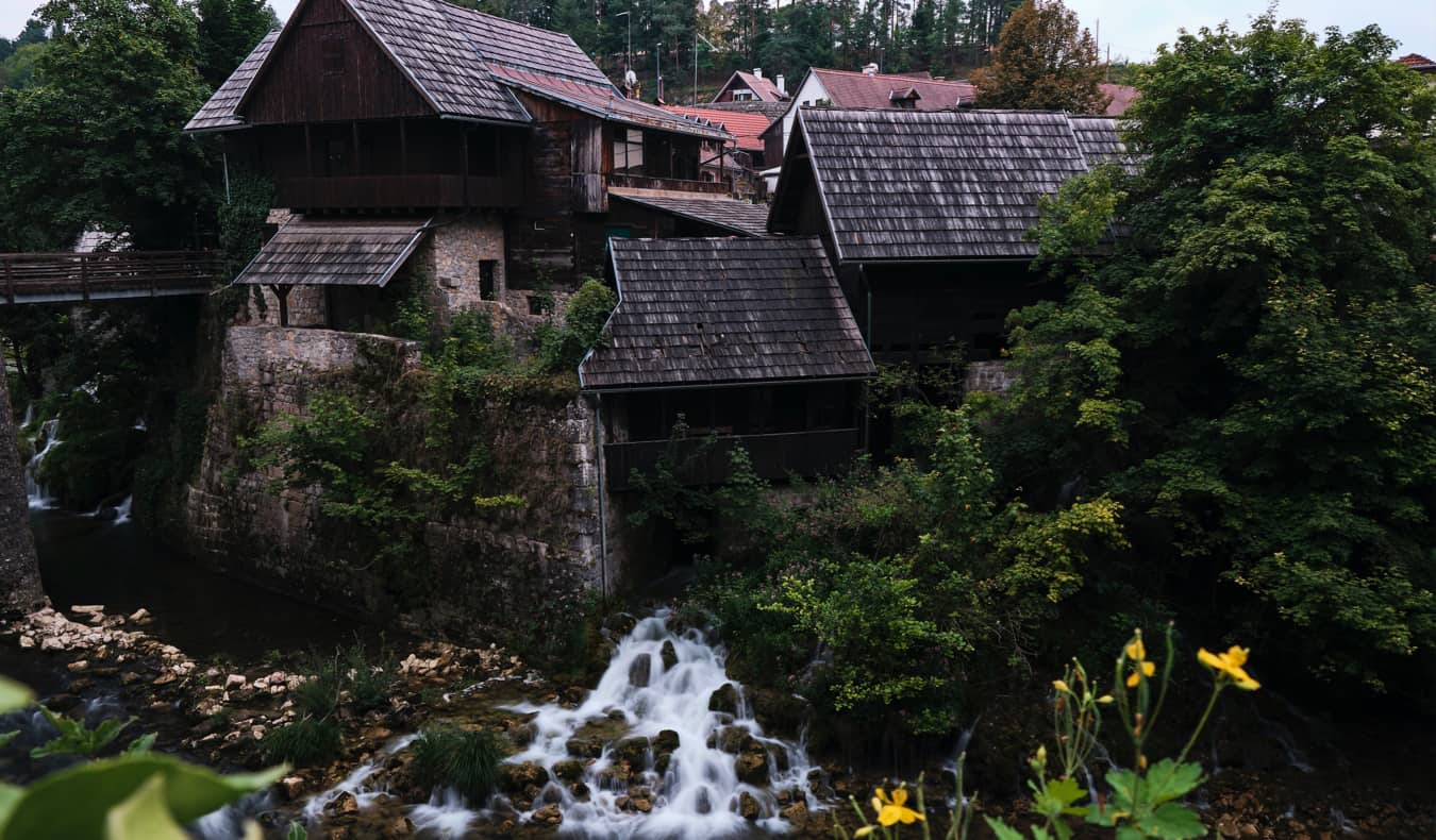 Old wooden houses near the river in Slunj, Croatia