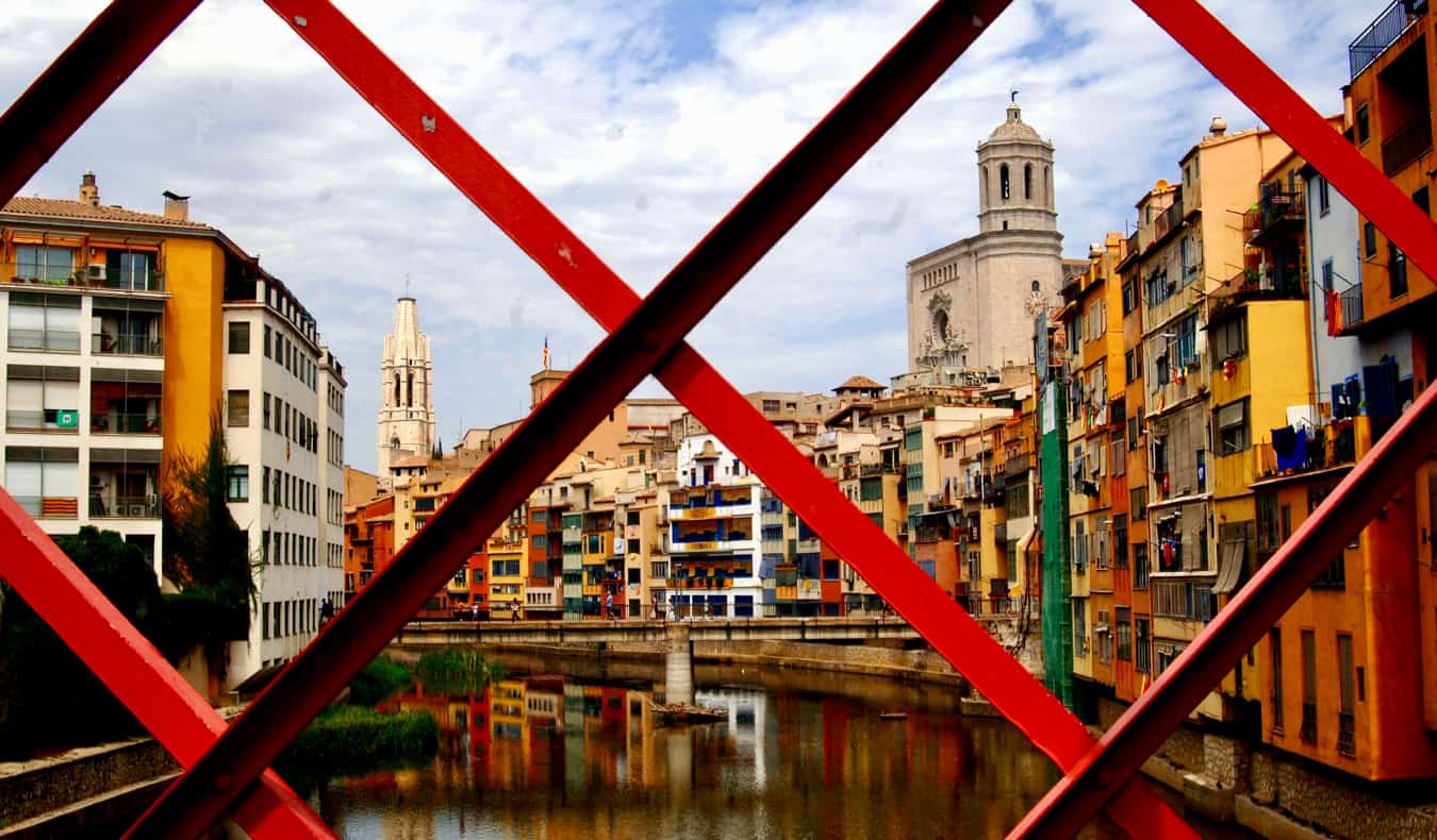 The bright red Eiffel Bridge in Girona, Spain