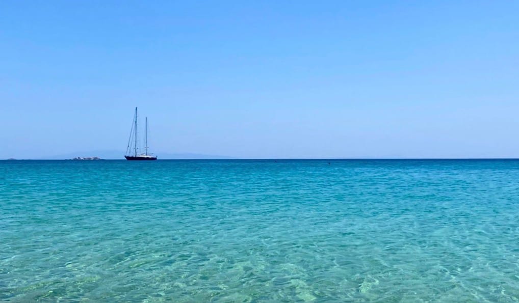 The calm, clear waters of the Cylades Islands in Greece in the summer