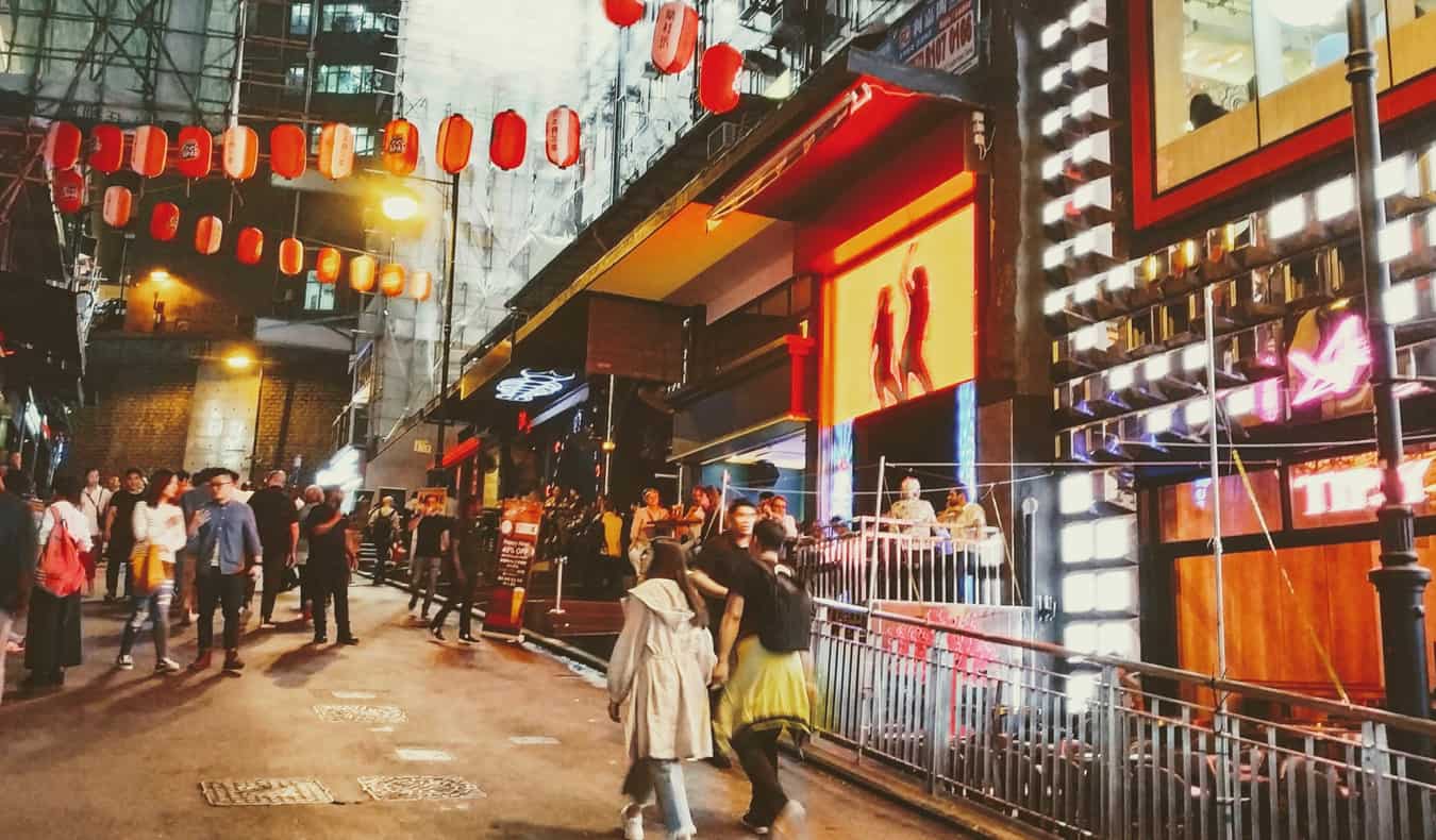 People enjoying the Lan Kwai Fong district in Hong Kong at night