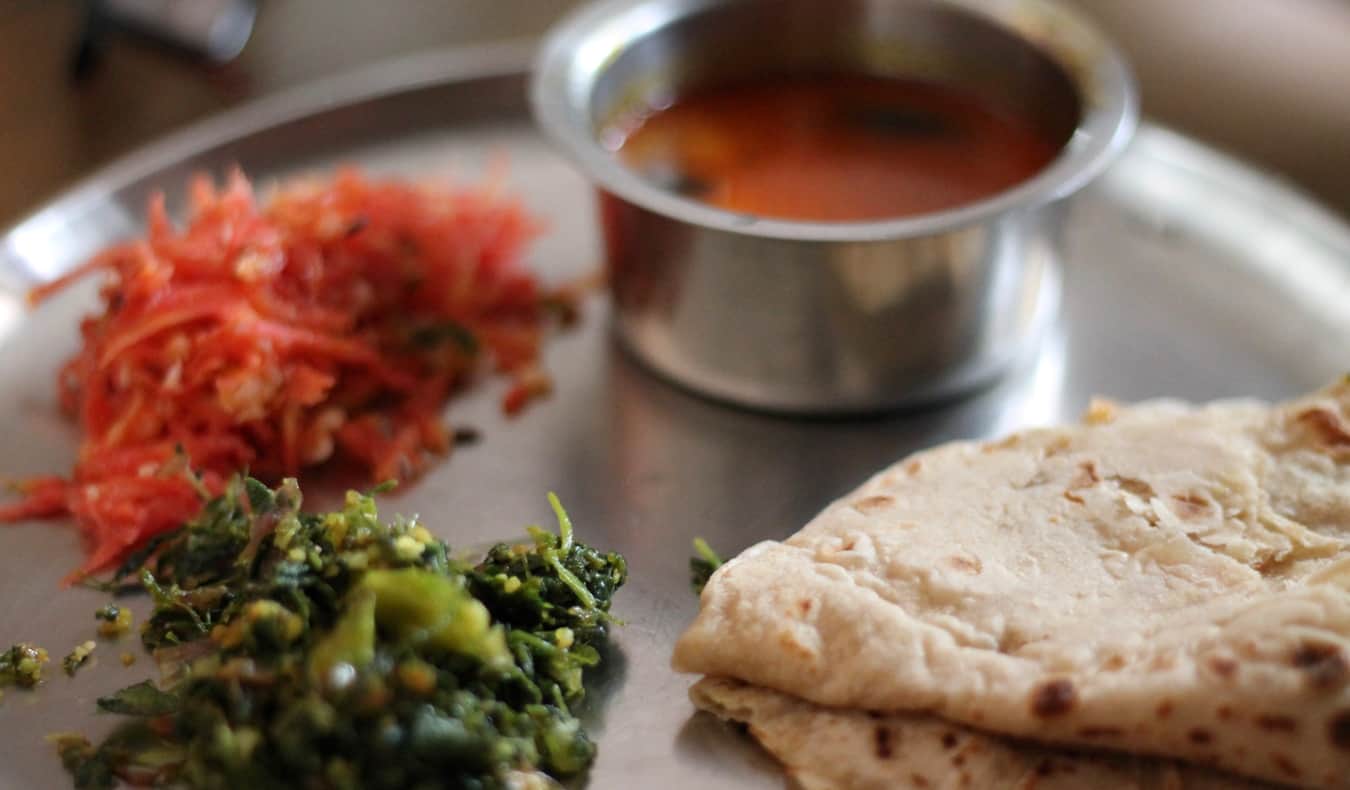 A food colorful platter of traditional thali food in India